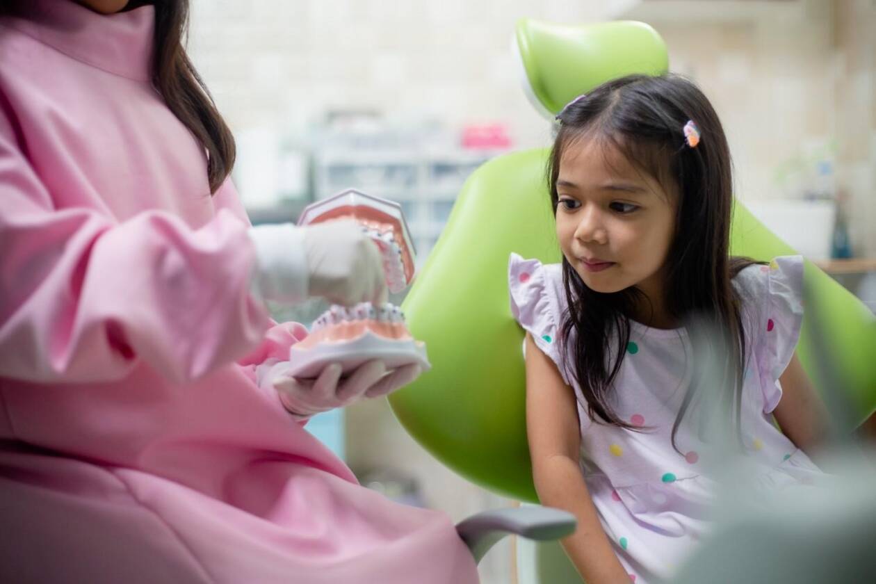 Child learning about dental care